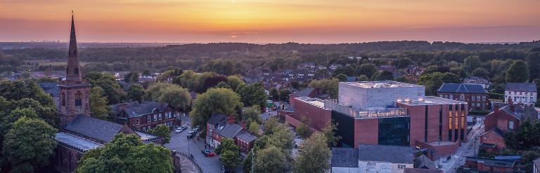 A landscape photograph of Shakespeare North Playhouse from above.